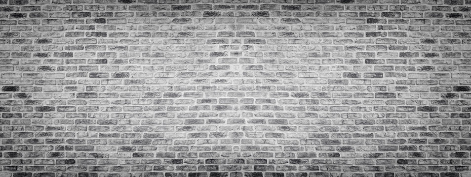 Fototapeta Wide gray rough brick wall texture. Old masonry panorama. Panoramic brickwork background