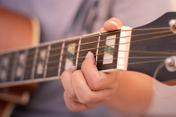 Playing the guitar in the evening