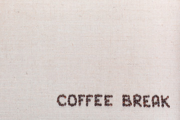 Coffee break writing from beans, arranged bottom right