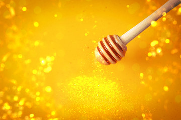 Dipper and sweet honey, closeup. Space for text