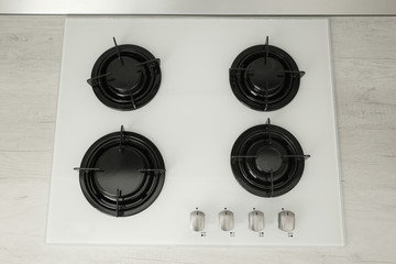 Modern built-in gas cooktop, top view. Kitchen appliance