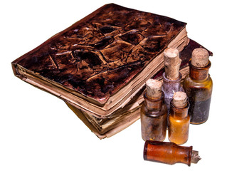 Old magical books and pharmacy bottles isolated on white background
