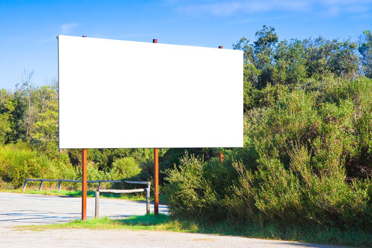 Blank Advertising Billboard Immersed In A Rural Scene