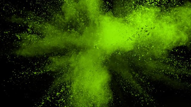 Super Slowmotion Shot of Green Powder Explosion Isolated on Black Background at 1000fps.