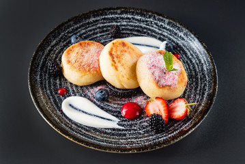 soft cheese pancakes with berries