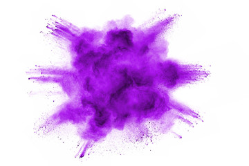 Freeze motion of purple color powder exploding on white background.