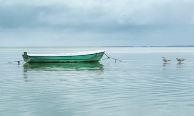 Empty Boat in the Sea Water