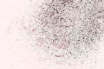 Vintage pink background. Rough painted wall of living coral color. Imperfect plane of beige colored. Uneven old decorative toned backdrop of beige tint. Texture of pink hue. Ornamental stony surface.