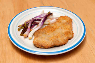 豚カツと赤ラッキョウ炒め物添え