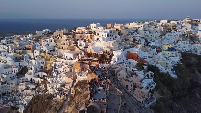 Flight over of Oia town just before sunset, Santorini island, Greece