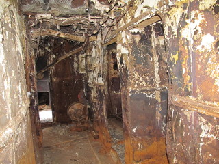 the rusted insides of an old ship