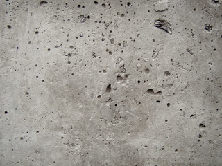 Background concrete wall. Caverns. Inclusions from wood. Texture with smudges, trushins.