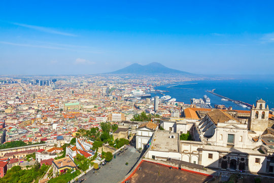 Panoramic aerial view of Napoli city with famous Mount Vesuvius and Gulf of Naples on the background, Campania region, Italy