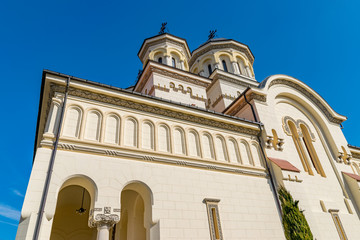 Obraz premium Beautiful view to the Coronation Reunification Cathedral in Alba Iulia city, Romania. A church a sunny day in Alba Iulia, Romania