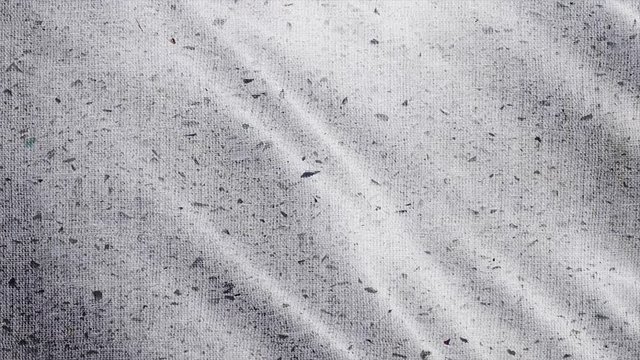 Grizzled, greying fabric cloth detailed macro shot. Close up vintage 