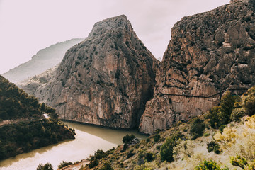 Bridge over de river among rock mountains in south of Spain