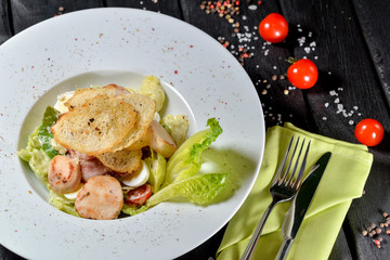 Caesar salad in the author's presentation of the chef