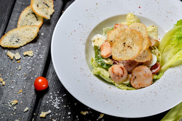 Caesar salad in the author's presentation of the chef