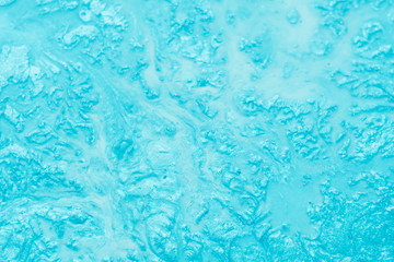 Abstract art texture background. Dried lava design. Beautiful sky blue paint with small bubbles and shimmering effect.