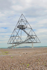 Tetrahedron in German Bottrop taken on a cloudy summer day. The walkable steel structure built on a mine dump in North Rhine-Westphalia region is reminiscent of the Sierpinski tetrix