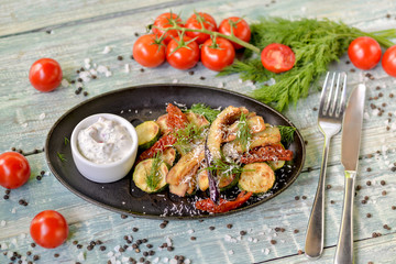 chicken with vegetables and spices on plate