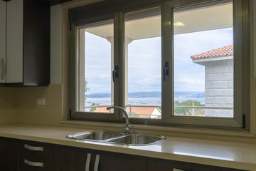 Beautiful sea view from the kitchen of a beach house located in a small town in Spain