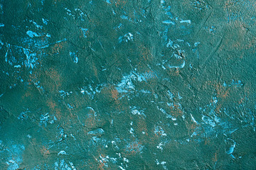 Abstract textured emerald green color concrete effect painted background