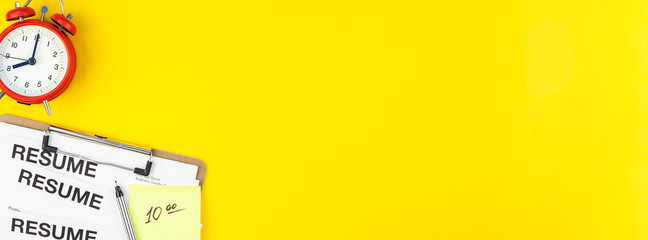 We are hiring flat lay on yellow background
