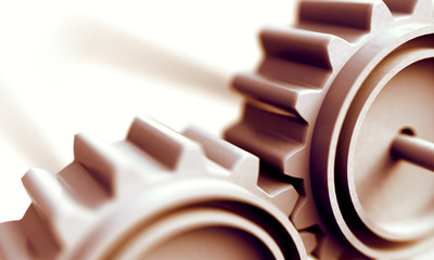 Grupo de mecanismos y engranajes.Fondo de ingeniería industrial y motor.Concepto de trabajo en grupo y cooperación