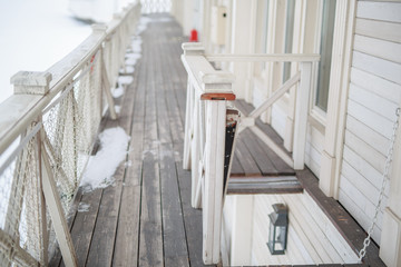 the deck of the ship in the winter the view from the street, painted white, vintage