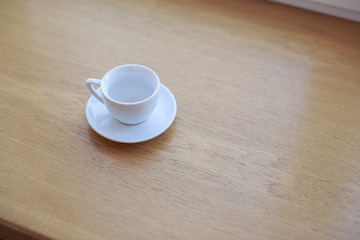 wooden table white Cup and saucer top view