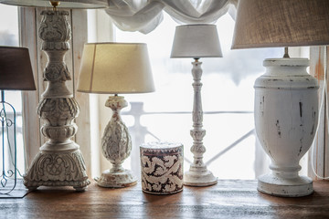 wooden legs of table lamps of vintage style of light color