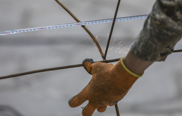 worker welder weld metal wire