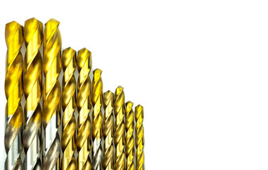 Fototapeta premium Set of drill bits different sizes for wood and concrete on isolated white background.