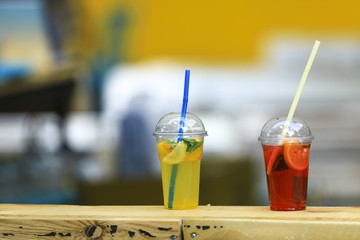 two glasses with a fruit cocktail