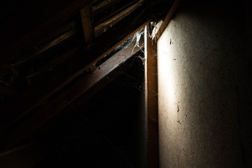 window light in dark old Abandoned Attic