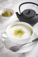 matcha latte image on marble background