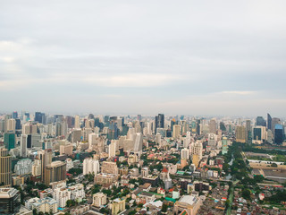 Fototapeta premium Bangkok midtown city building with BTS sky train aerial view