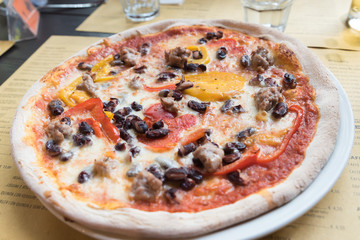 Neapolitan pizza sausage with peppers and mushrooms