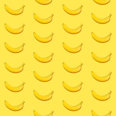 Seamless pattern of bananas on yellow background