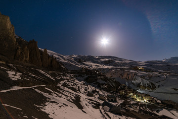 Moonrise in Winter spiti over village in himalayas - spiti valley