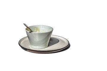 View of ceramic coffee cup and saucer on white background