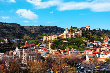 Fototapeta na wymiar Aerial view of old Tbilisi, Georgia during the day. Narikala castle