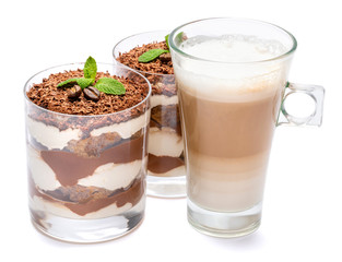 Classic tiramisu dessert in a glass and cup of coffee isolated on a white background with clipping path