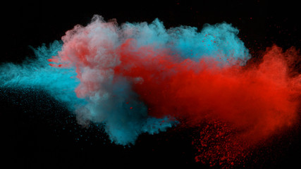 Fototapeta na wymiar Collision of colored powder isolated on black
