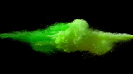 Collision of colored powder isolated on black