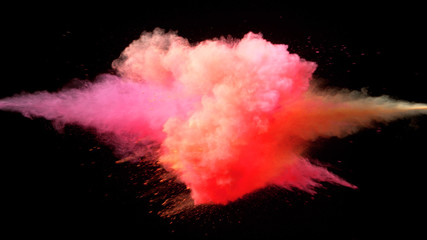 Collision of colored powder isolated on black