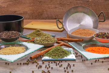 Exotic spices on rustic wood table