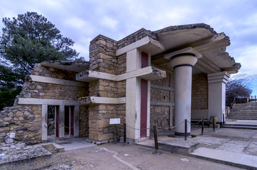 Knossos, Crete - Greece. The South Propylaeum at the archaeological site of Knossos which is the largest Bronze Age archaeological site on Crete and has been called Europe's oldest city. Cloudy sky