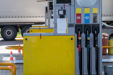 Fuel station with fuel pistols